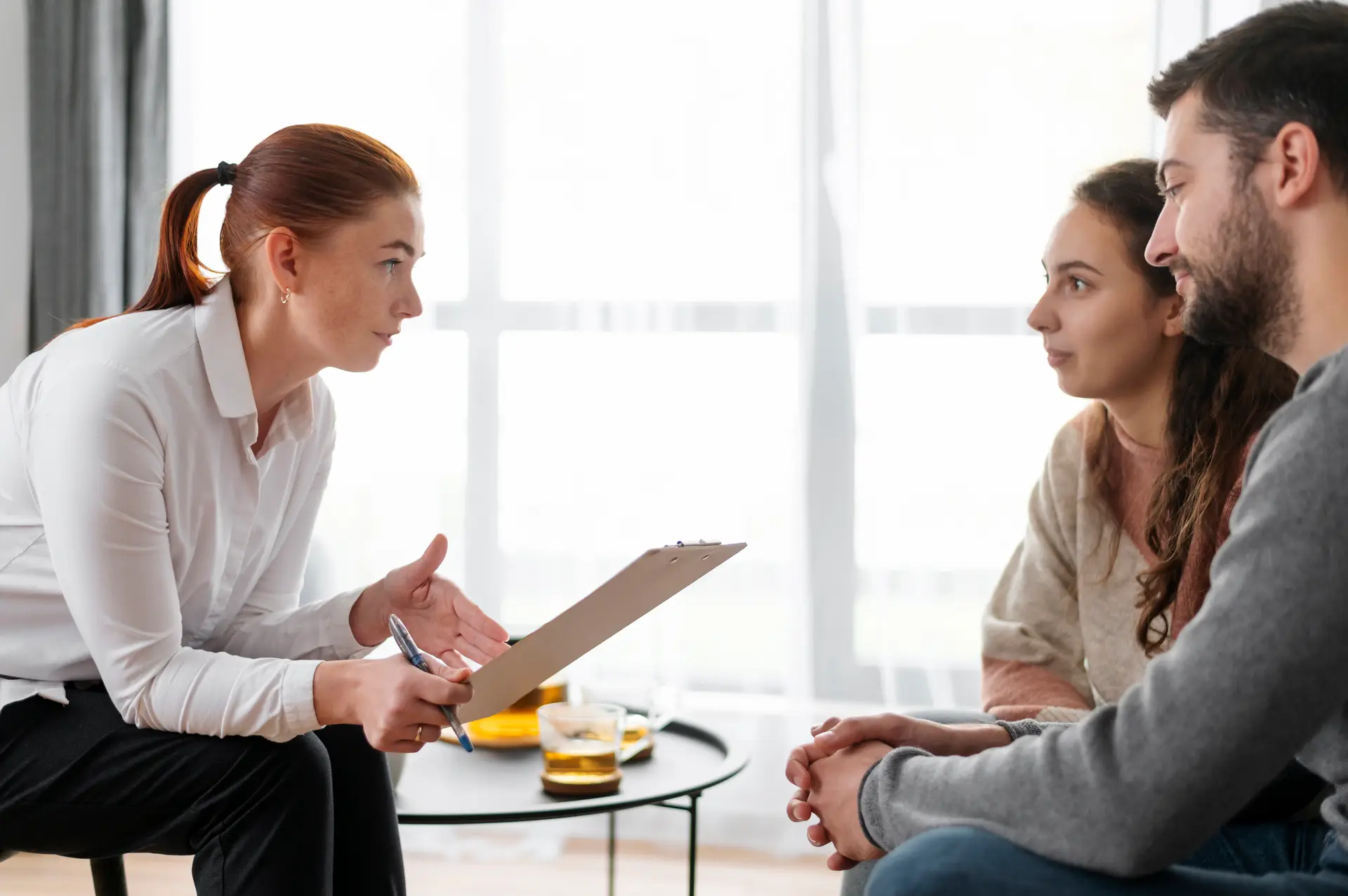 people discussing with therapist